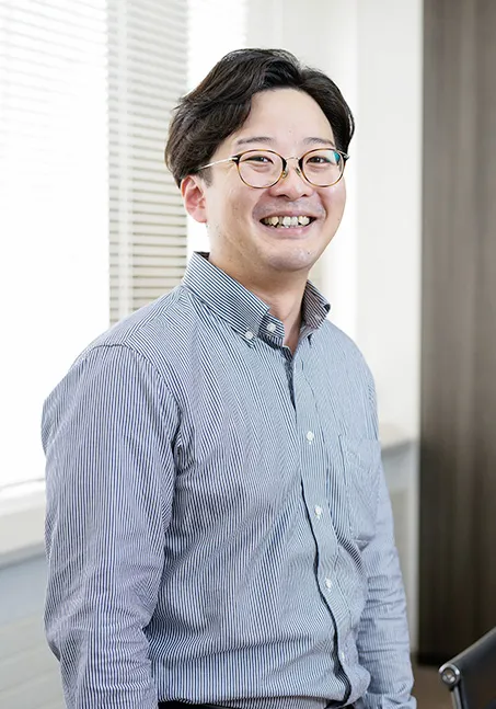 情報機器事業本部T.M.